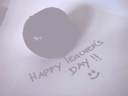 Jabłko szczęśliwego dnia nauczyciela